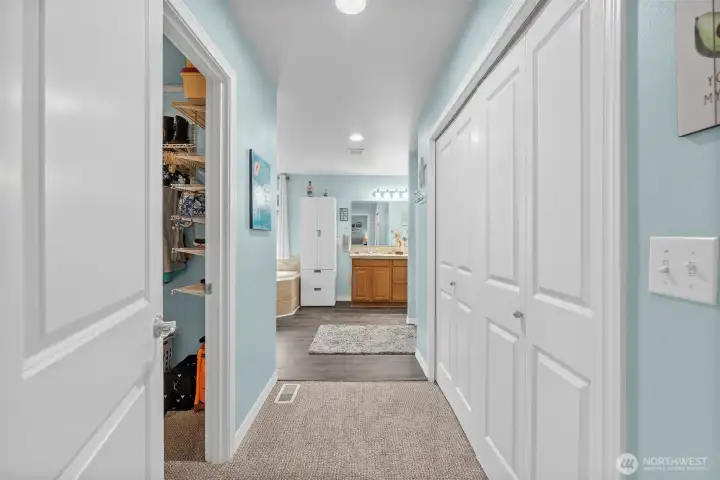 Large 5-piece primary bathroom with walk-in closet