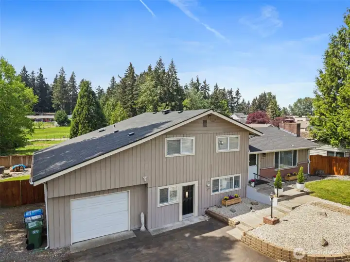 The oversized garage offers more parking plus attic storage & there's great space for your tools & toys. RV parking & a double gate is at the left of the home