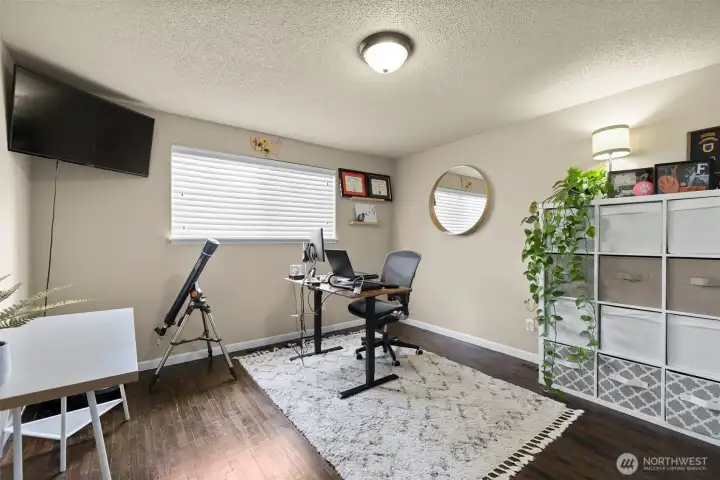 2 more spacious bedrooms also feature gleaming hardwood floors & nice faux wood blinds