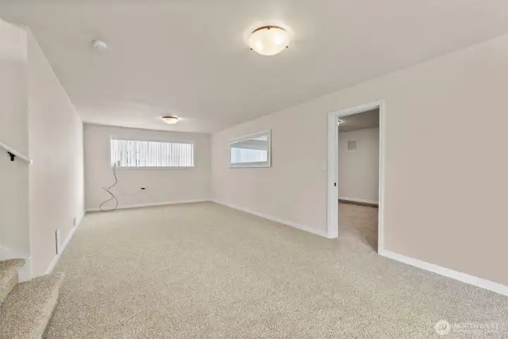 The huge bonus space with new carpeting & fresh paint offers potential for an ADU/multi-generational living or a home business - or just enjoy all the added living area