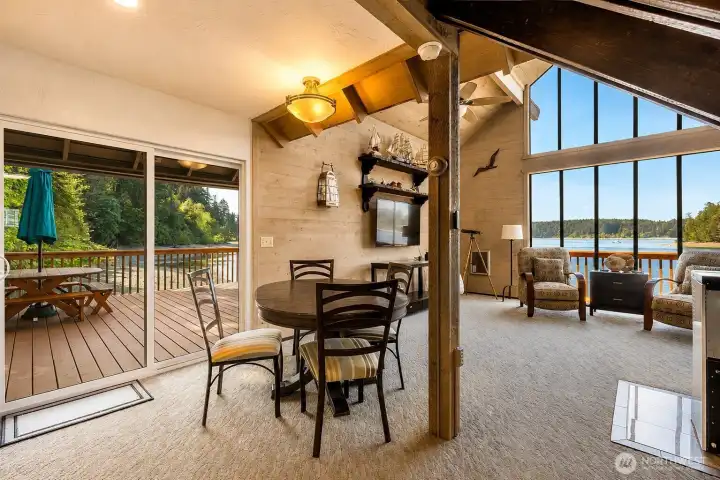 Every inch of your home is inviting & comfortable, every view from every window is fabulous.  The dining is open concept with living and kitchen and opens onto outdoor eating area on deck.