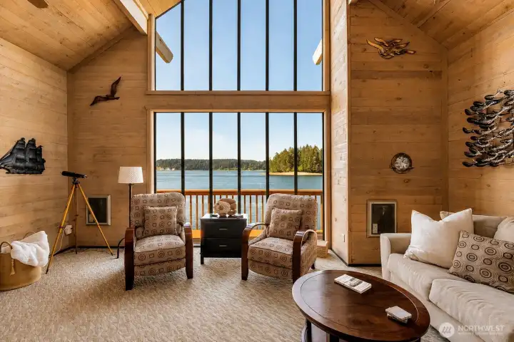 Enjoy the warmth of the pellet stove AND the view of the sound!