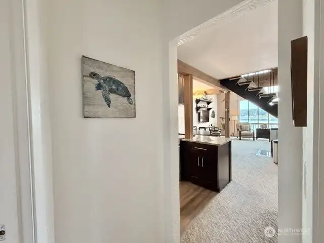 hallway between bedroom and bath
