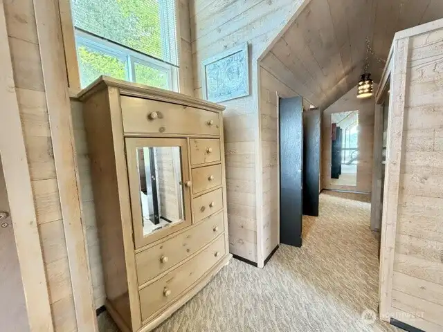 Loft/ bedroom has closets & room for dressers & storage shelving as well, in addition to 3 private sleeping areas.