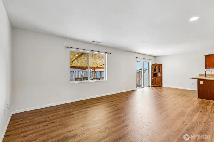 6404 35th ST NE, Marysville features a large living room that connects to the kitchen with dining room.