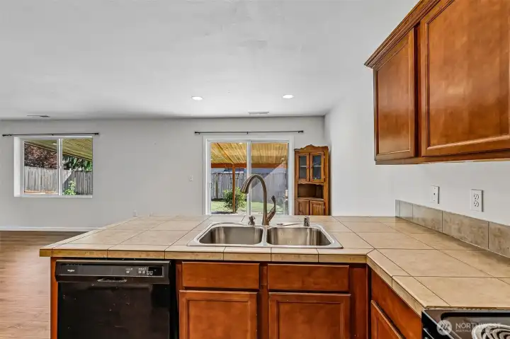 Look out from the kitchen onto the patio and living room