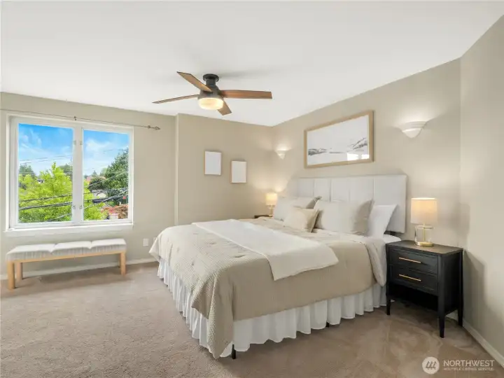Welcome to the spacious primary bedroom, featuring large windows, soft natural light, and ample room for furnishings and everyday comfort. Welcome to the spacious primary bedroom, featuring large windows, soft natural light, and ample room for furnishings and everyday comfort.
