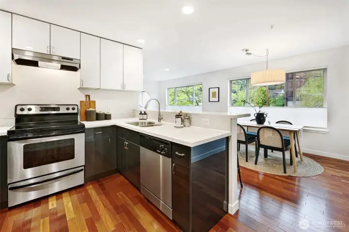 Chill in the summer, but never lacking natural light with walls of windows and an open floor plan - welcome to top floor living in the heart of Kenmore!