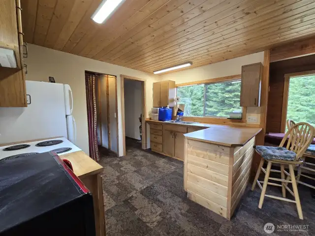 Nice sized kitchen with butcher block counters.