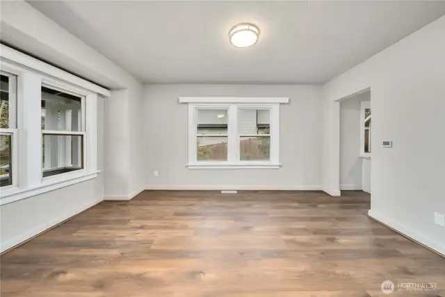 Notice all the large windows in the dining room to let the natural light in.