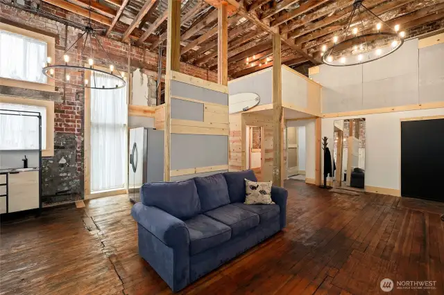 Hardwood floor in main room in back of building. Unique style