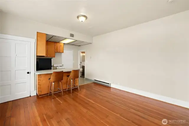 Open wooded floor in living room upstairs apartment