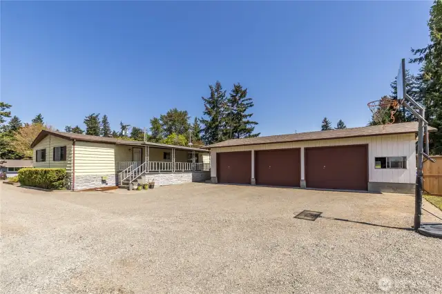 Well-maintained double-wide with a 3-car detached garage