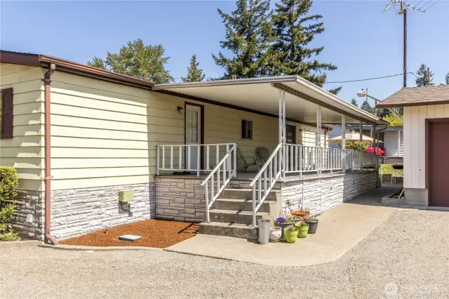 Covered back deck runs nearly the full length of the home