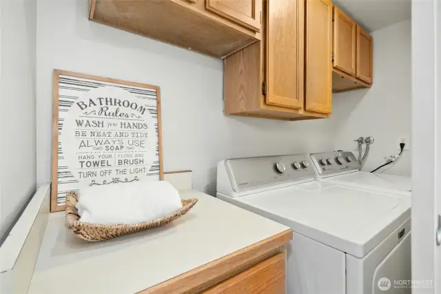 Extra storage along with a full sized washer and dryer.