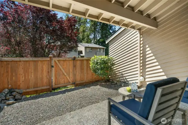 Covered patio with rare private fenced yard!