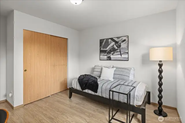 Laminate flooring in bedrooms.