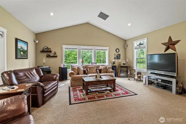 Another view of the spacious, carpeted great room.