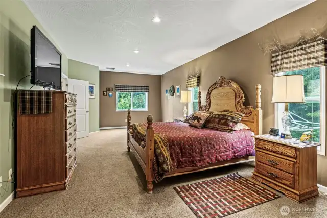 Main suite is generously sized and affords room for oversized furnishings plus allows for additional areas for reading, relaxing or simply sitting space!