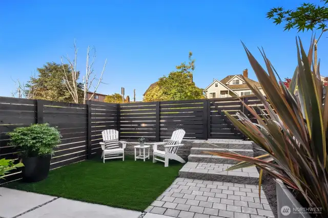 The painted black fence is stunning.