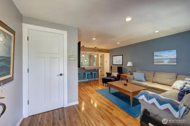 From the main entry looking into the living room and kitchen