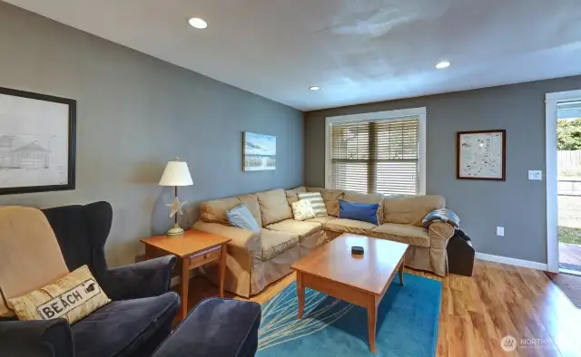 Living room with the main entry to the right.