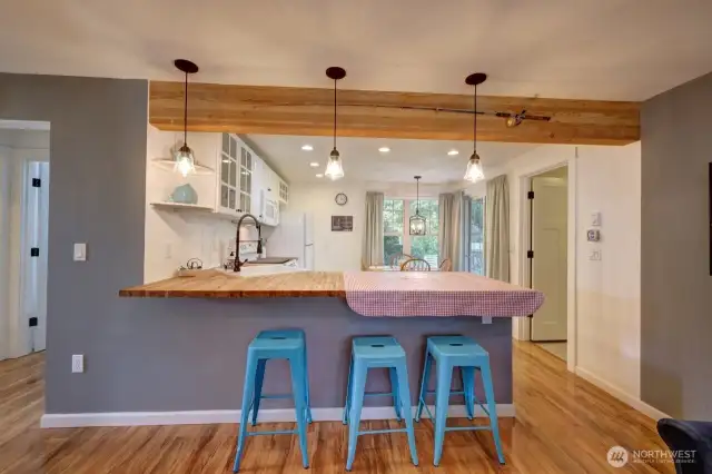 Breakfast bar and dining area. The kitchen has access to the laundry room garage and back deck