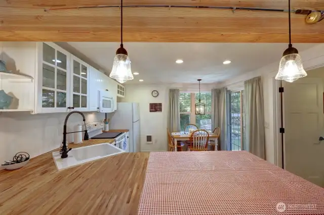 Breakfast bar and dining area. The kitchen has access to the laundry room garage and back deck