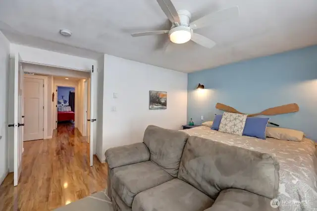Primary bedroom with walk in closet and sitting area