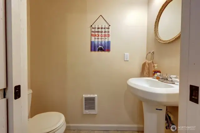 1/2 bath off the laundry room and kitchen.