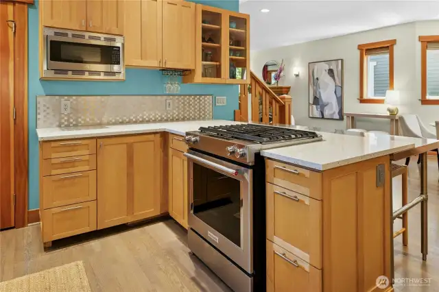 Quartz counter top with stainless back splash