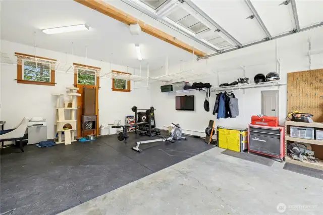 large garage with 10 1/2 foot ceilings ; large 9' door for easy access for tall vehicles.