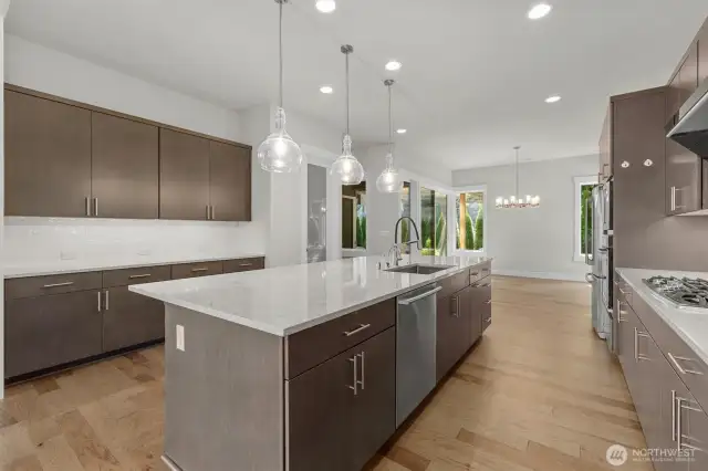 Gourmet kitchen with high-end finishes, oversized island and plenty of storage. Perfect for cooking and entertaining.