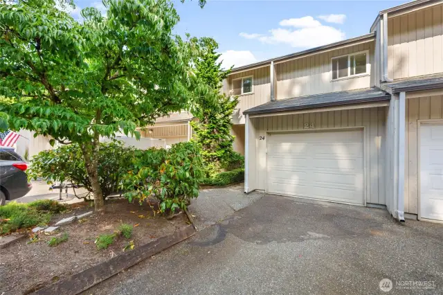 Single car garage with parking in front of garage for additional vehicles. Plus additional guest parking across the street.