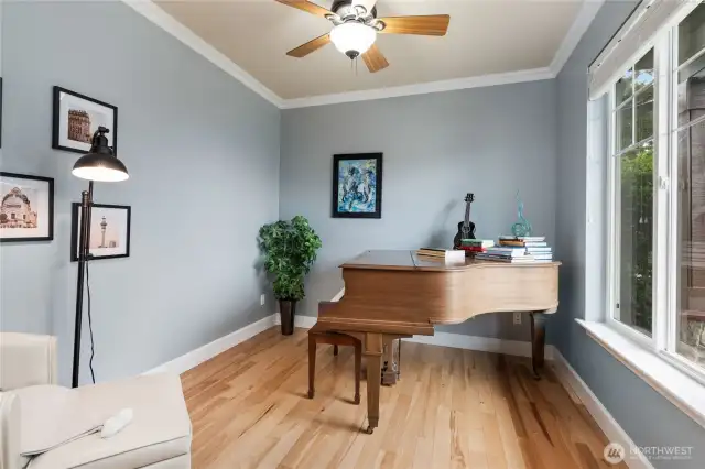This fabulous office can also serve as a music room, art studio, or cozy den.