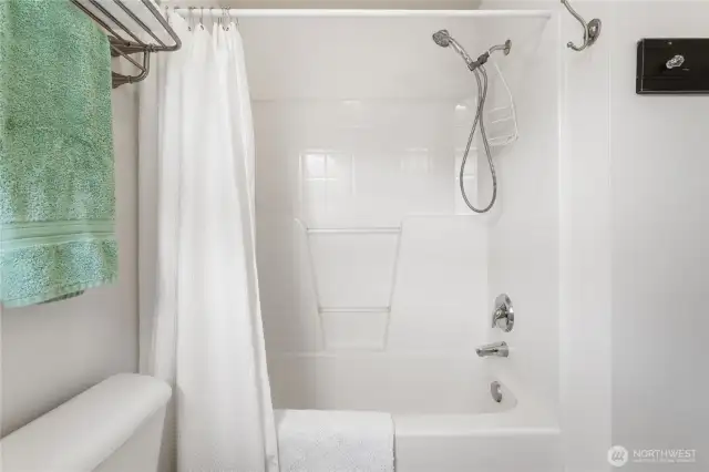 Upstairs hall bathroom with bathtub.