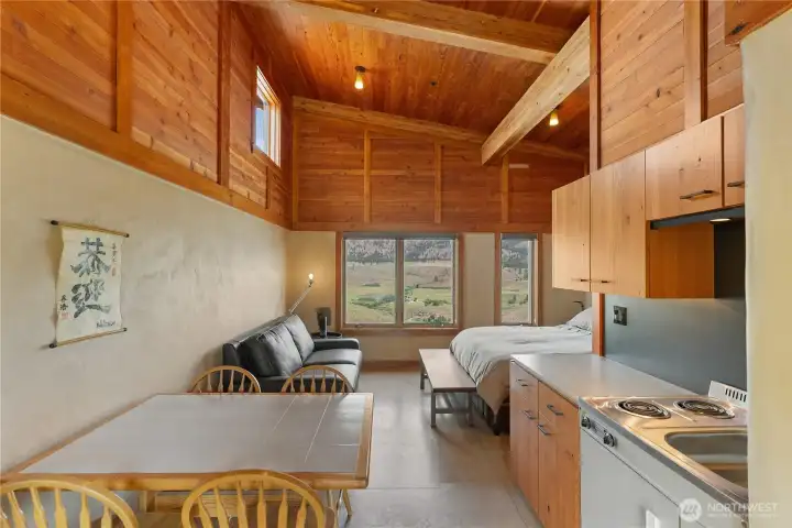 This space can function as a stand-alone studio apartment with it's own bathroom and private entrance off of the courtyard.