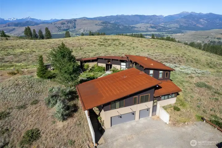 Looking southwest - although there is private land in that direction, and close, the adjacent lots have been developed in such a way that creates privacy in all directions.