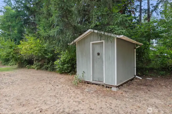 extra storage shed for yard tools.