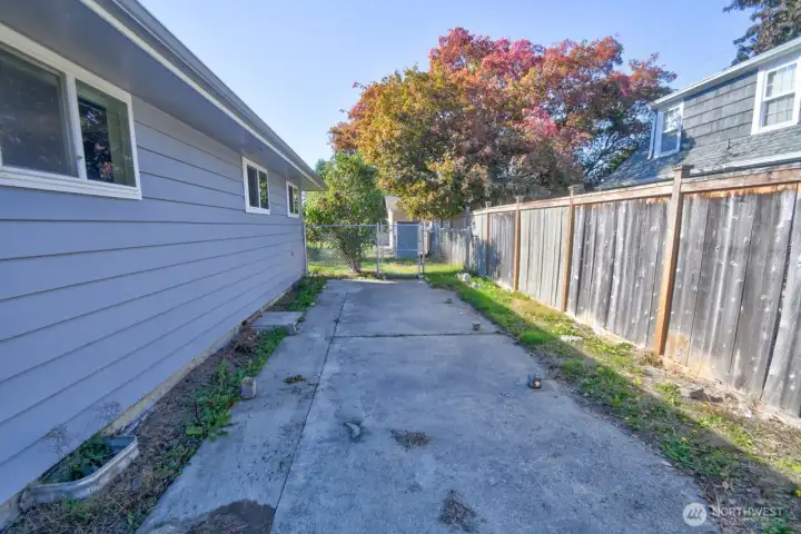 RV parking on the side or install a covered carport on this space.