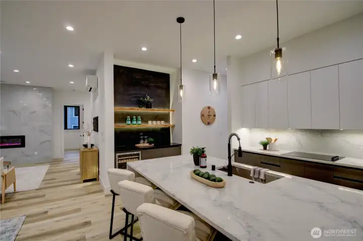 Wine refrigerator in the lower back ground.