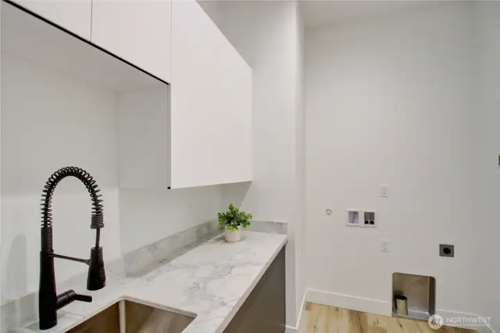 Luxury Laundry Room on the main level.