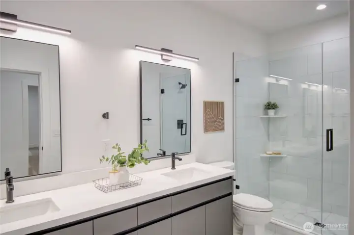 Full Bath located upstairs by both guest bedrooms.