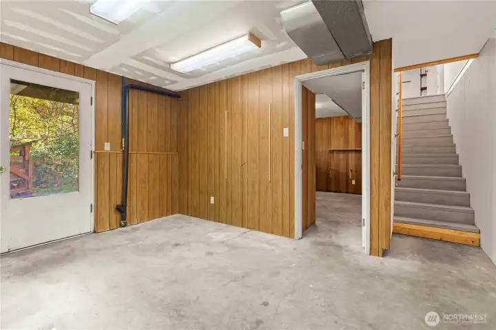 Downstairs area with door to the back yard