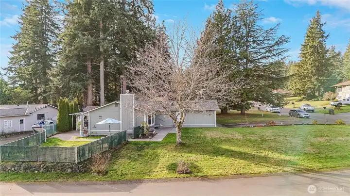 This shows the fenced area to keep the things you love nice and safe. Notice the sitting area with the umbrella a great place to keep an eye your loved ones.