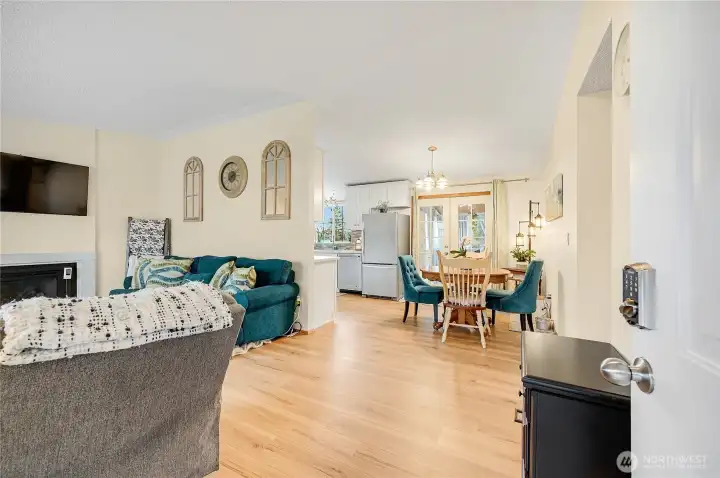 The living room flows nicely into the dining room.