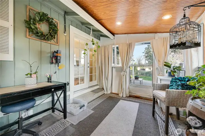 Another view of the enclosed patio that accesses the second patio and fenced in yard.