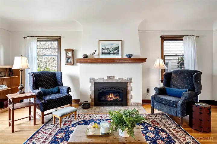 Gas fireplace with original tile surround.