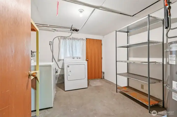 Dedicated Laundry room with Ample Storage and Exerior Door.