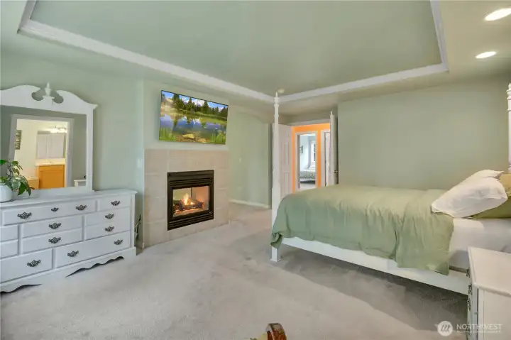 Primary Suite with cozy cas fireplace